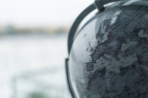 Earth map on a steel cage showing Europe and Africa. 3D rendering.Diffuse and bump maps for the world map are prepared via tracing images from www.nasa.gov in vector design software.Similar images:
