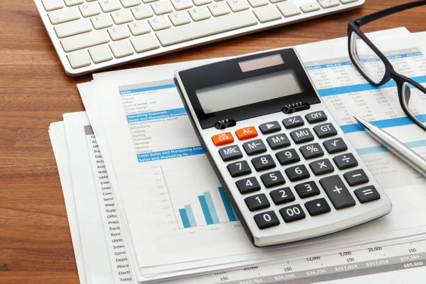 istock Financial accounting on wood desk 898463122