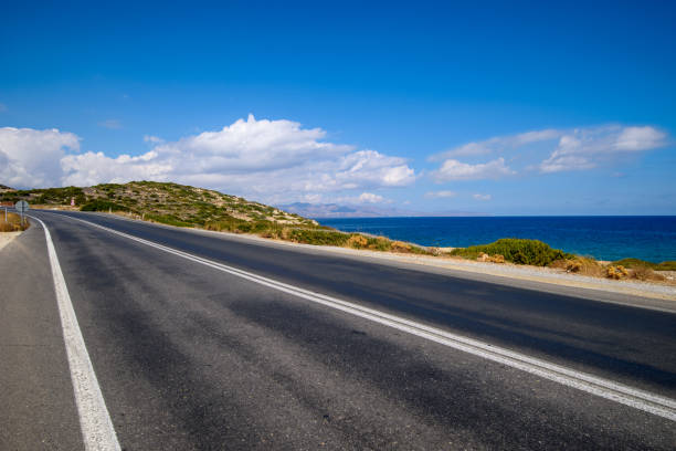 istock Asphalt road along the sea. Greece, Crete. 898464266