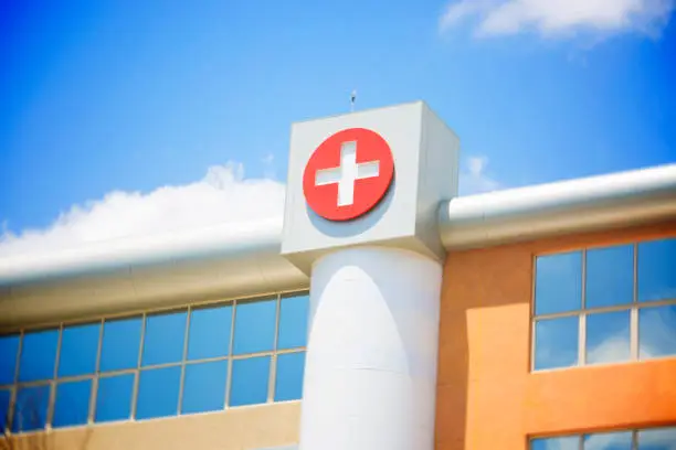 Photo of Cross symbol on hospital building