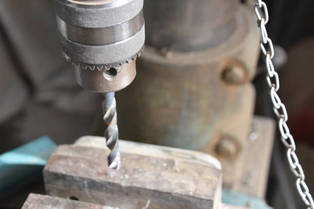 istock drill IN A Factory for manufacturing stickers 898466998