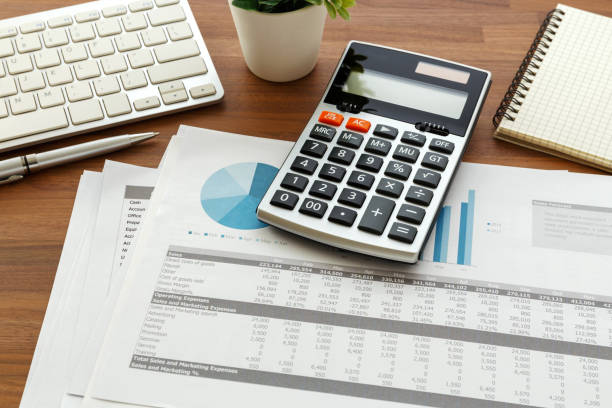 istock Financial accounting on wooden table 898467034