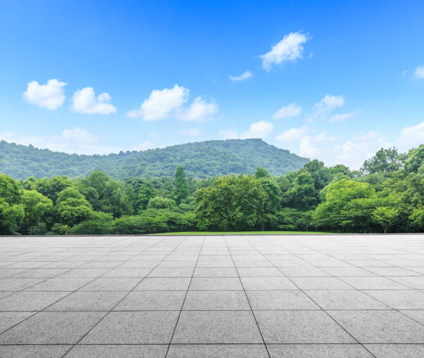 istock empty square and green mountain nature landscape in the park 898470254