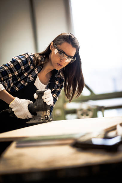 istock Young carpenter woman 898470850