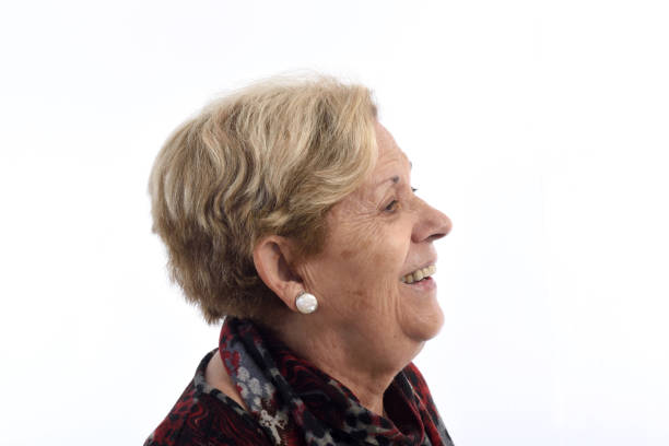 istock Senior woman on white 898474524