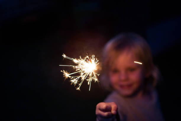 istock Happy child with a sparkler 898474746