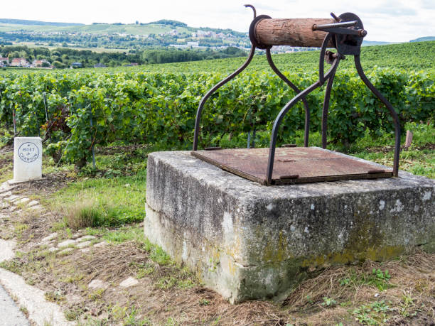 Ay, Champagne, France Ay, Champagne, France - 11 August 2014:  water well in the Hills covered with vineyards in the wine region of Champagne, France. Moet & Chandon moet chandon stock pictures, royalty-free photos & images