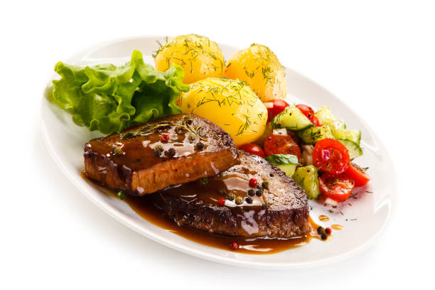 istock Grilled steak with boiled potataoes and vegetables 898479832