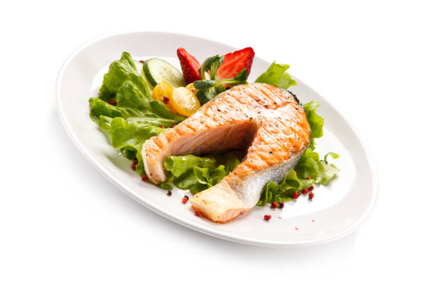 istock Fish dish - salmon steak and vegetables 898483078