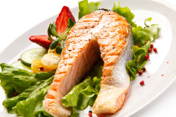 istock Fish dish - salmon steak and vegetables 898483096