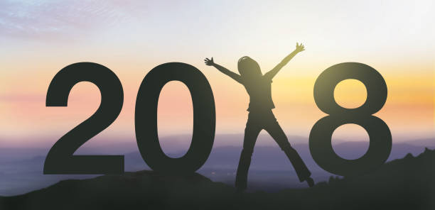 istock Silhouette people happy for 2018 new year. 898496890