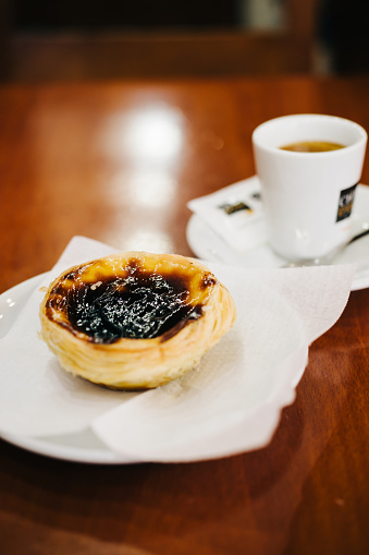 Portuguese Egg Tart And Coffee In Local Pastelaria