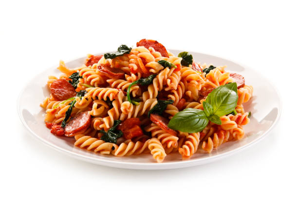 Fusilli with pesto sauce and pork Pasta with vegetables fusilli stock pictures, royalty-free photos & images