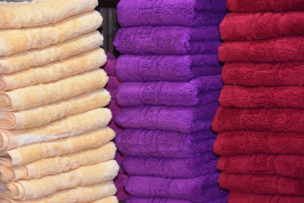 istock Set colorful towels in the store 898508884