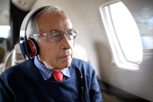 istock Businessman in private jet airplane 898509232