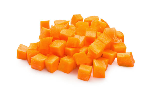 istock Chopped carrot slices isolated on a white background 898513448