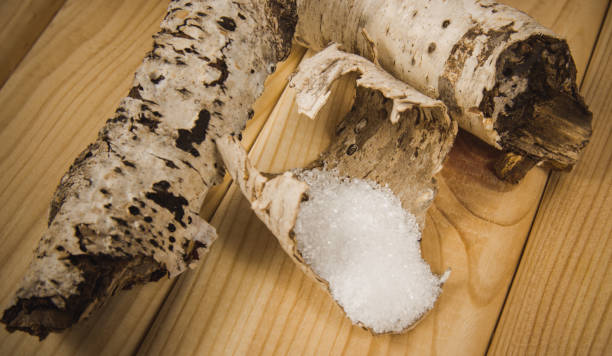 istock Xylitol - sugar substitute. Birch sugar on wooden background. 898517068