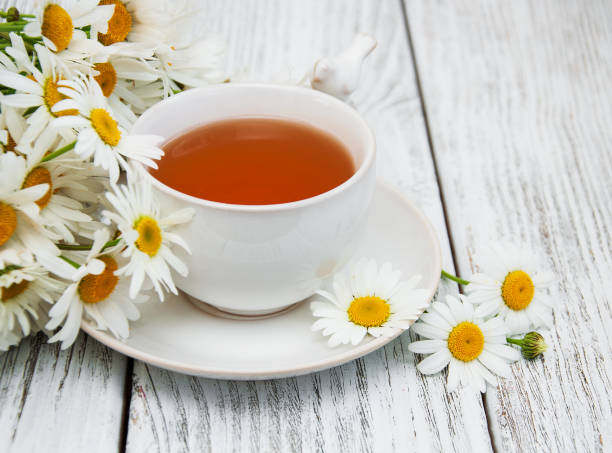 istock cup of herbal tea with chamomile flowers 898519554