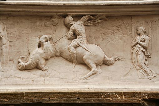 Statue representing saint george sculpted by Donatello, on the facade of Orsanmichele church in Florence