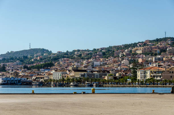 panoramic view of the port and city of lixouri on the island of cephalonia View from a dock of the port and city of Lixouri located in the same bay and facing the city of Argostoli capital of the island of Kefalonia lixouri stock pictures, royalty-free photos & images