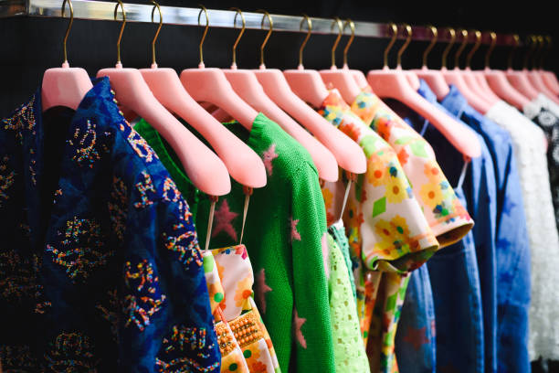 istock Rows of colorful clothes hanger in wardrobe 898531492