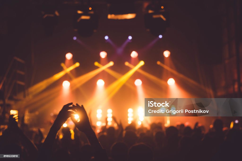 applause and raised hands at concert. Nightclub life Ibiza Island Stock Photo