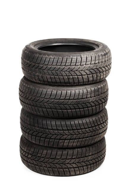 used winter tires stack, isolated on white