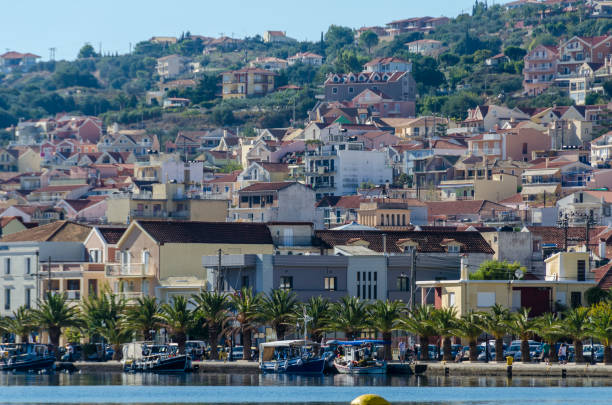 Close-up of the harbor and downtown Lixouri on the island of Kefalonia Close-up of the port and center of Lixouri city located on the same bay and facing the city of Argostoli capital of the island of Kefalonia lixouri stock pictures, royalty-free photos & images