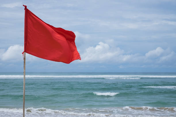 istock A red warning flag on the beach in the Nuca Dua Bali 898540488