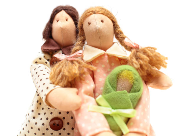 istock Handmade family doll on white background - portrait 898540834
