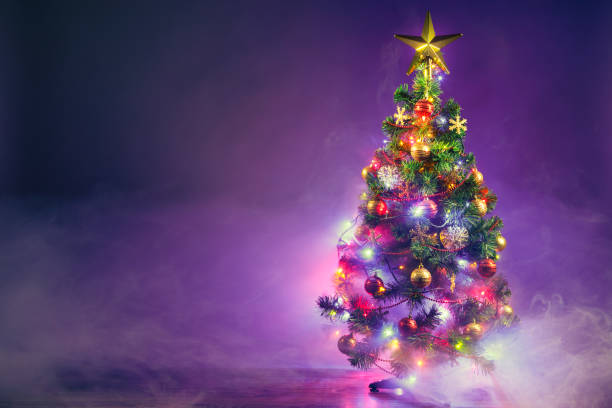 istock Christmas tree in frozen mist 898541552