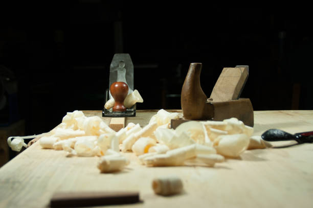istock Woodworking planes on a workbench with a dark moody background. 898541732