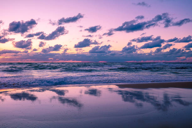 istock Beautiful beach in evening with reflection. The time after sunset 898541812