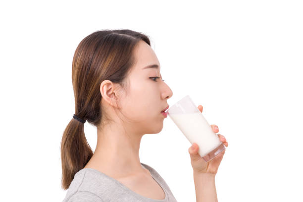 istock Woman drinking milk 898544348