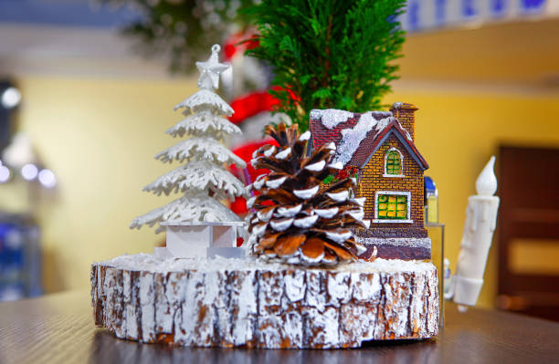 istock Christmas miniature house and fir tree 898544732