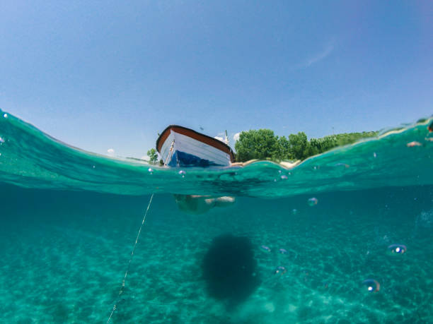 istock Kid swimming in the sea 898559046