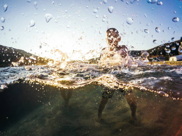 istock Kid swimming in the sea 898559214