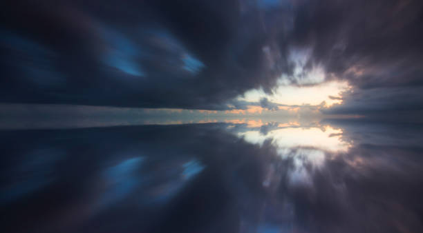 istock Reflection of dramatic clouds taken with long exposure 898563284