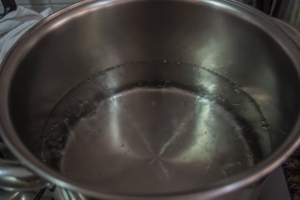 istock pot pan with hot water to make food 898566302