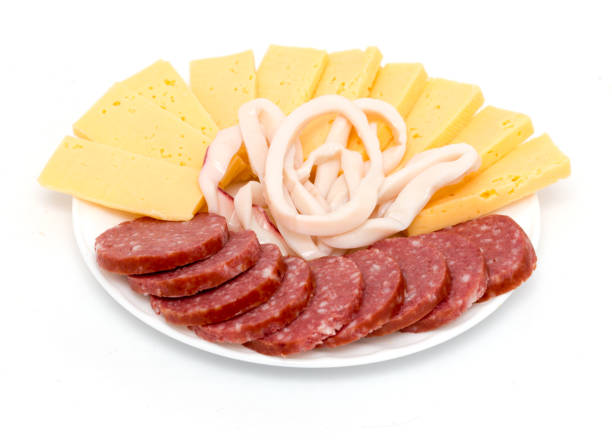 istock sausage and cheese on a white background 898569714