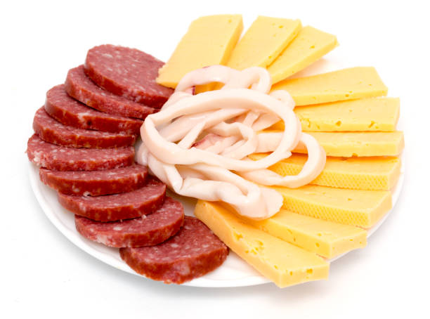 istock sausage and cheese on a white background 898569764