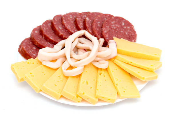 istock sausage and cheese on a white background 898569816