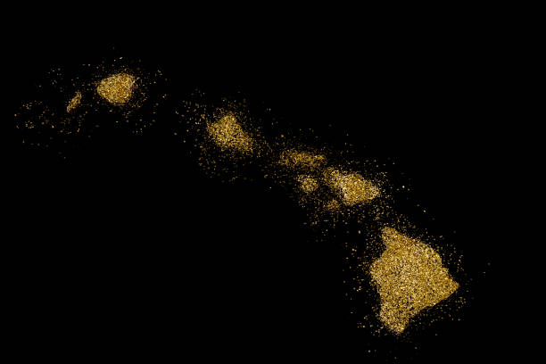Hawaii shaped from golden glitter on a black background (series)