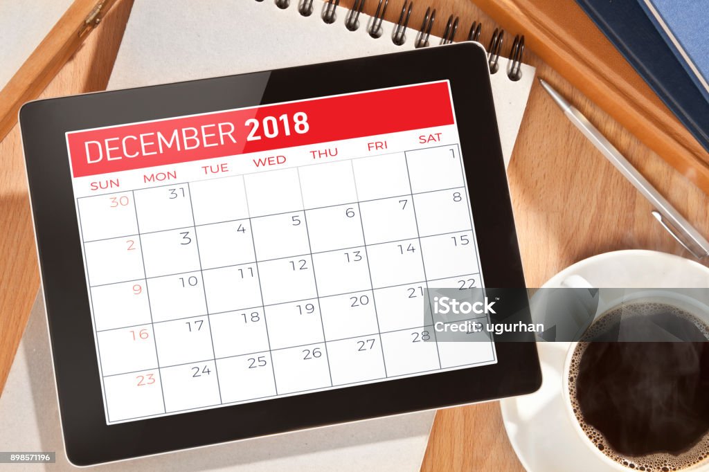 Calendrier sur tablette numérique - Photo de Calendrier libre de droits