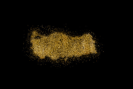 Turkey shaped from golden glitter on a black background (series)