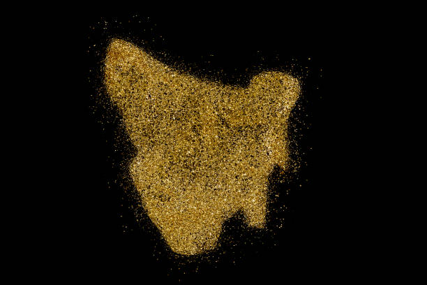 istock Tasmania shaped from golden glitter on black (series) 898574570