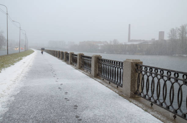 istock First snow on the street. 898578022