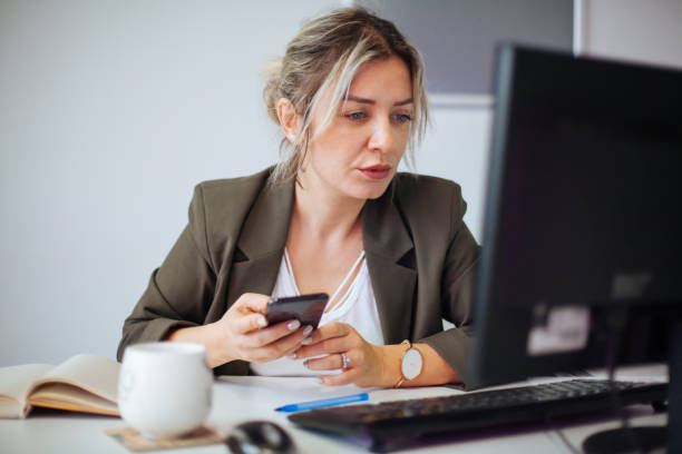 istock Business woman working at her desk 898581590