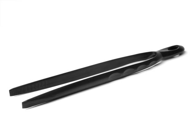 istock Black plastic cooking tongs 898585558