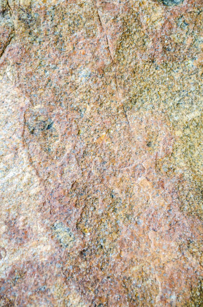 istock Gray background made of natural stone 898589284
